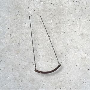 Elegant Red and Black Necklace with Curved Bar Pendant